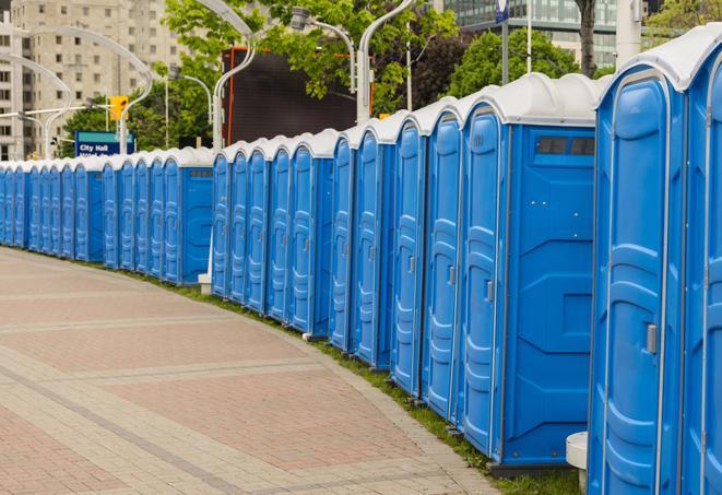 a row of portable restrooms ready for eventgoers in Clementon, NJ